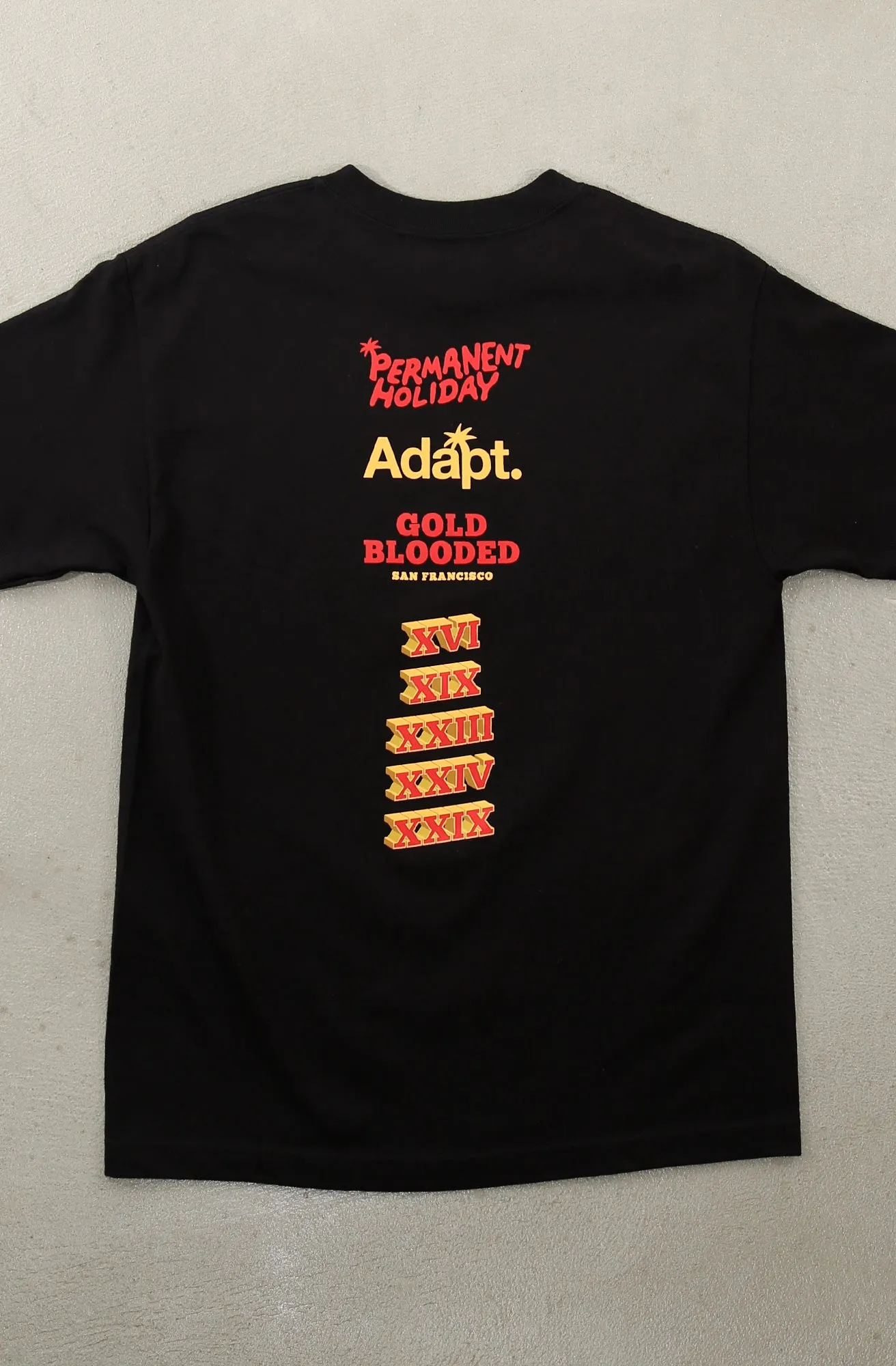 Permanent Holiday X Adapt :: Gold Blooded Holiday (Men's Black Tee)